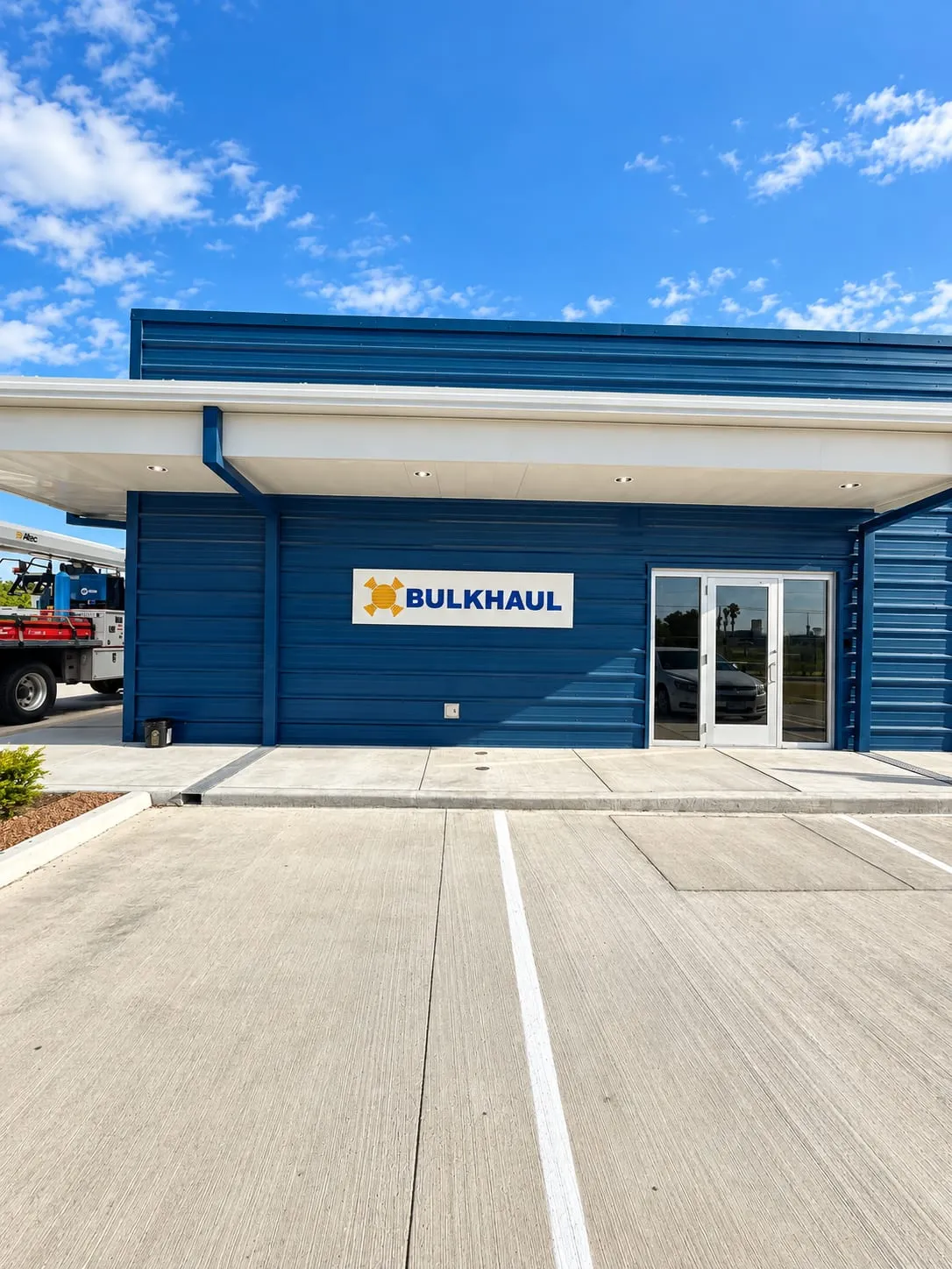 BULKHAUL Warehouse Entrance in Blue and Gold