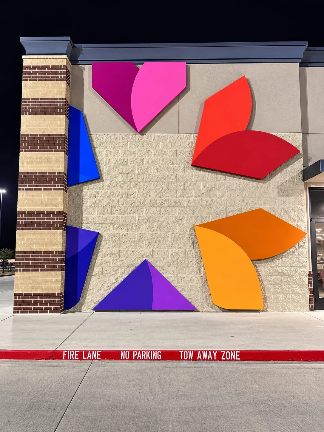 Colorful Geometric Facade at Night